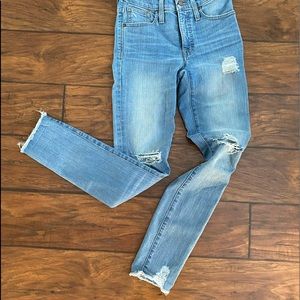 Madewell High-Rise skinny jeans with distressed knees and hem